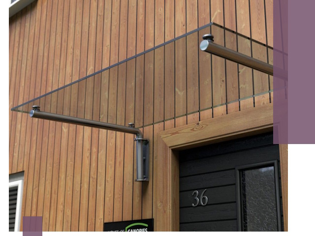 Стеклянные козырьки на входы и фасады в Калининграде